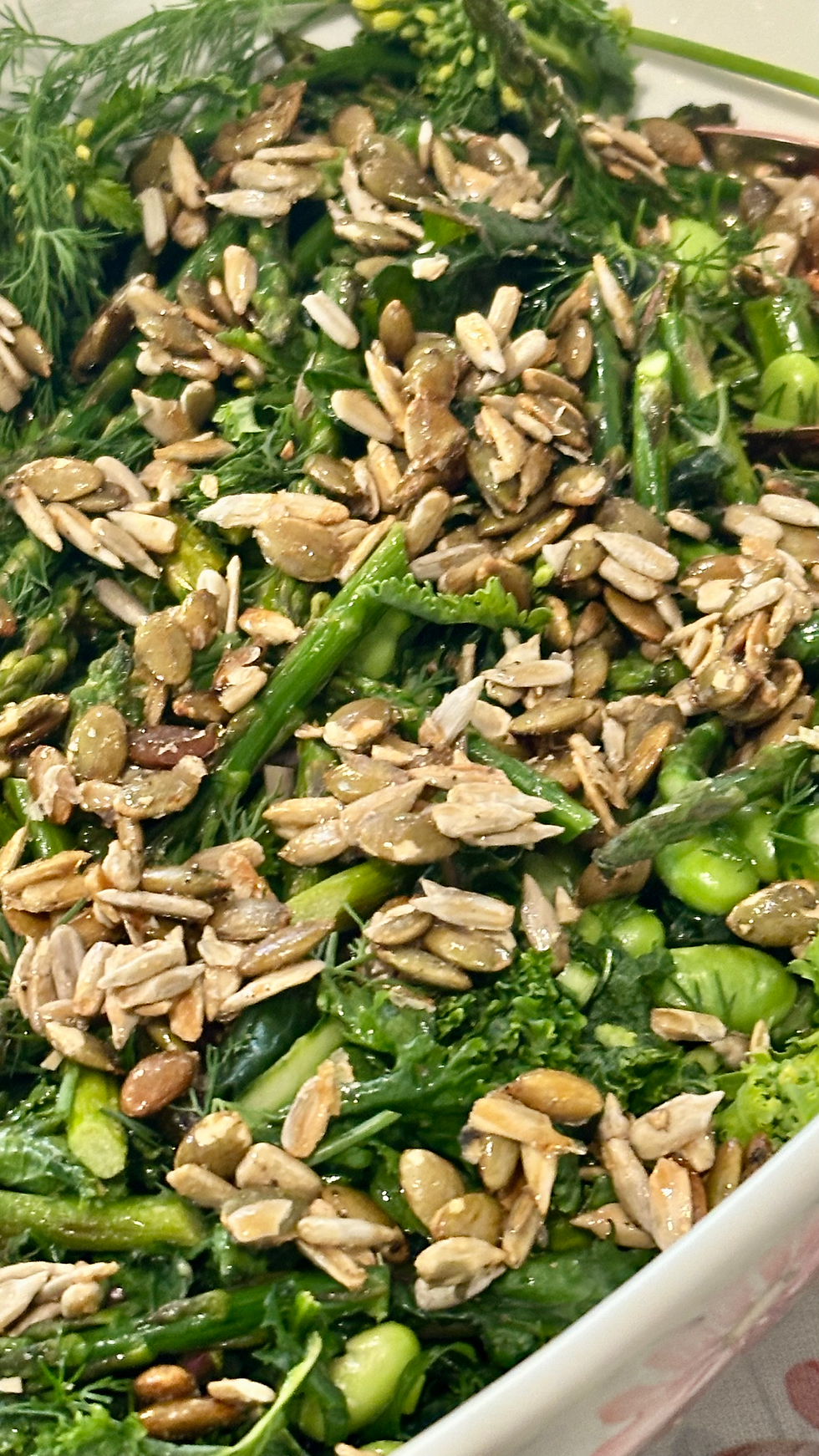 Kale salad with Ottolenghi's tasty sweet and salty seed topping is made with sunflower and pumpkin seeds, and Canadian maple syrup