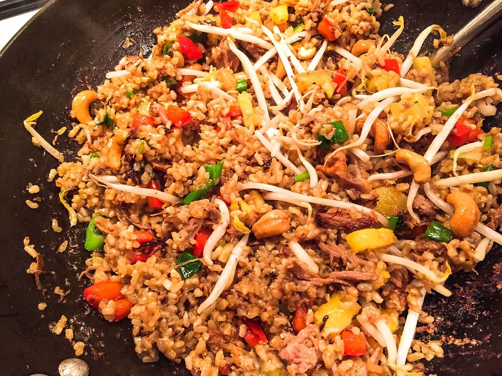 Leftover pulled pork is not wasted when it's up-cycled into a tasty Pineapple and Pork Fried Rice dish with peppers and bean sprouts