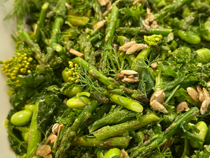 A bowl of kale salad with edamame, dill and asparagus for spring