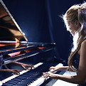 Woman Playing Piano