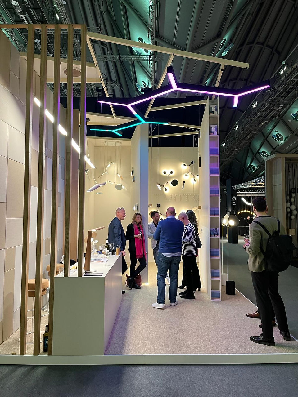 Guests interacting at Tunto Lighting's stand during the Light + Building Fair 2024, Frankfurt.