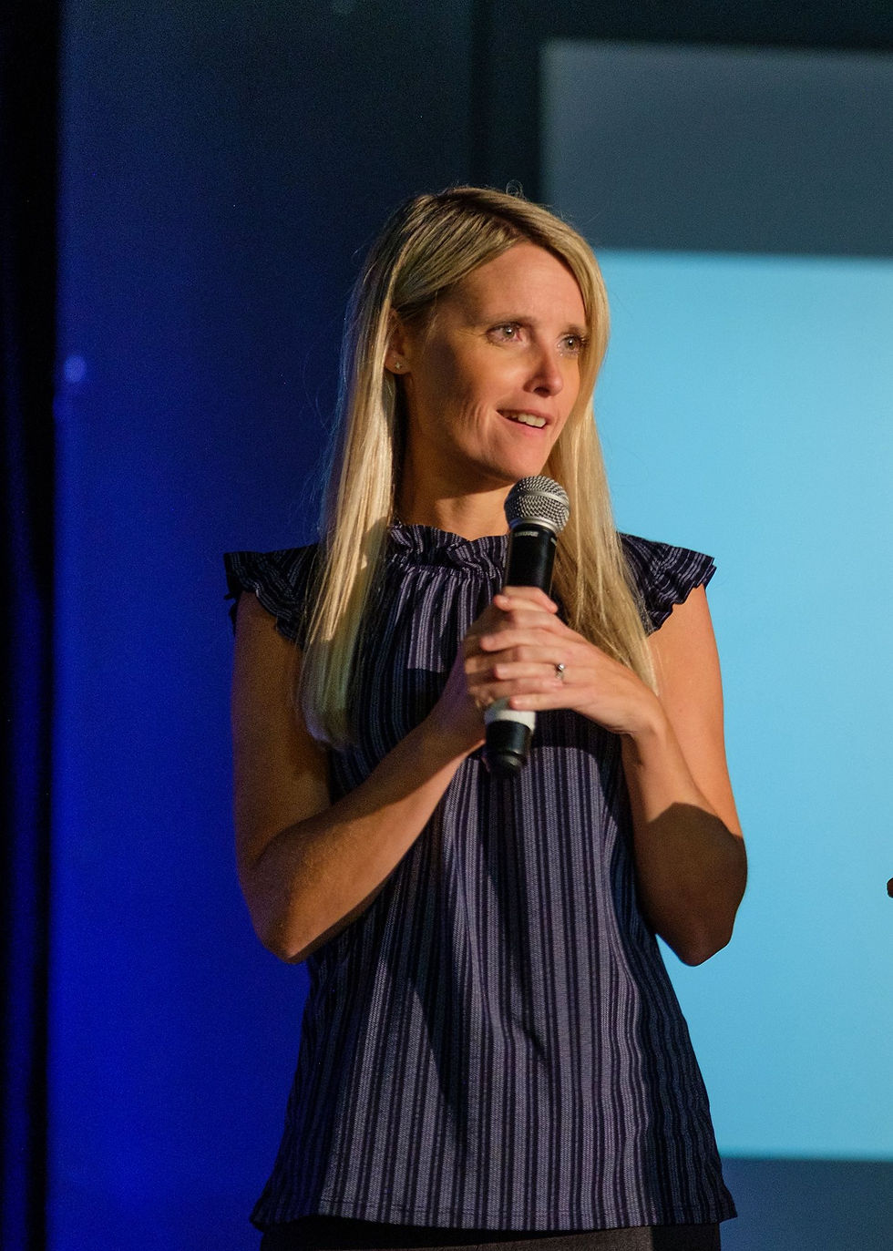 Image of Erin Merryn guest speaker at CAC of Cherokee County’s 25th Anniversary Blue Tie Gala September 4, 2025.