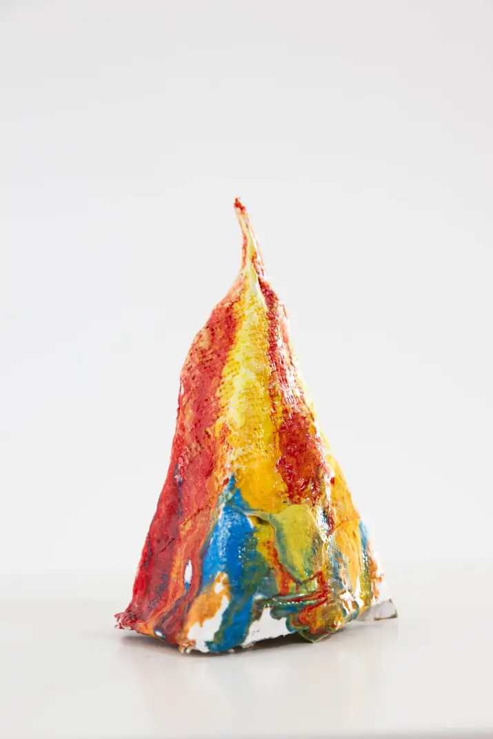 Abstract mixed-media object created with plaster, pigments and epoxy. Inspired by Wonder Woman as an icon of feminist pop culture, the work represents female empowerment, equality and the values of courage, resilience, independence, empathy, truth and justice.