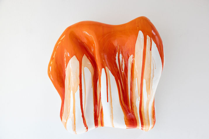Abstract orange and white dripped ceramic sculpture