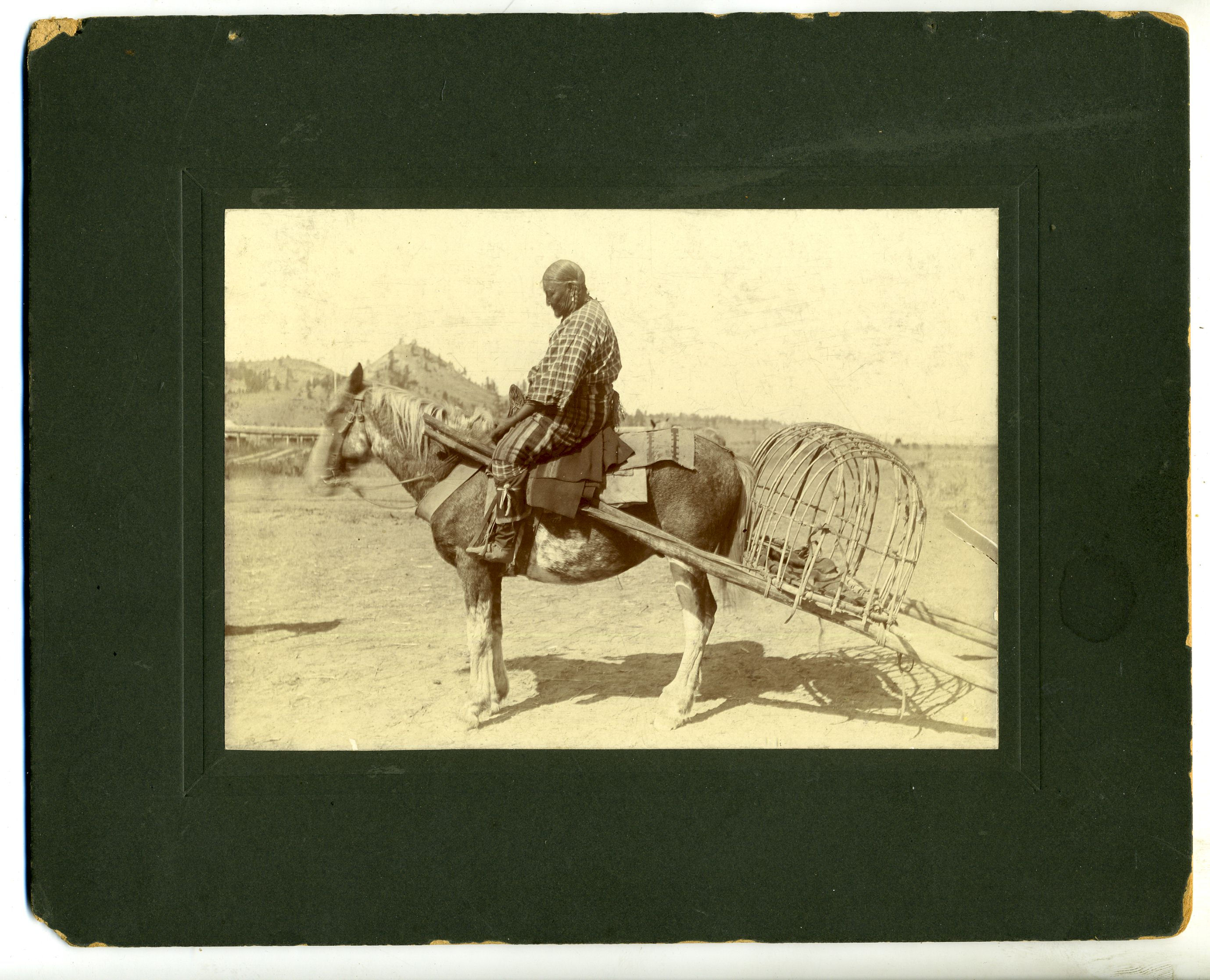 PHOTOGRAPH - CHEYENNE WOMAN WITH TRAVOIS