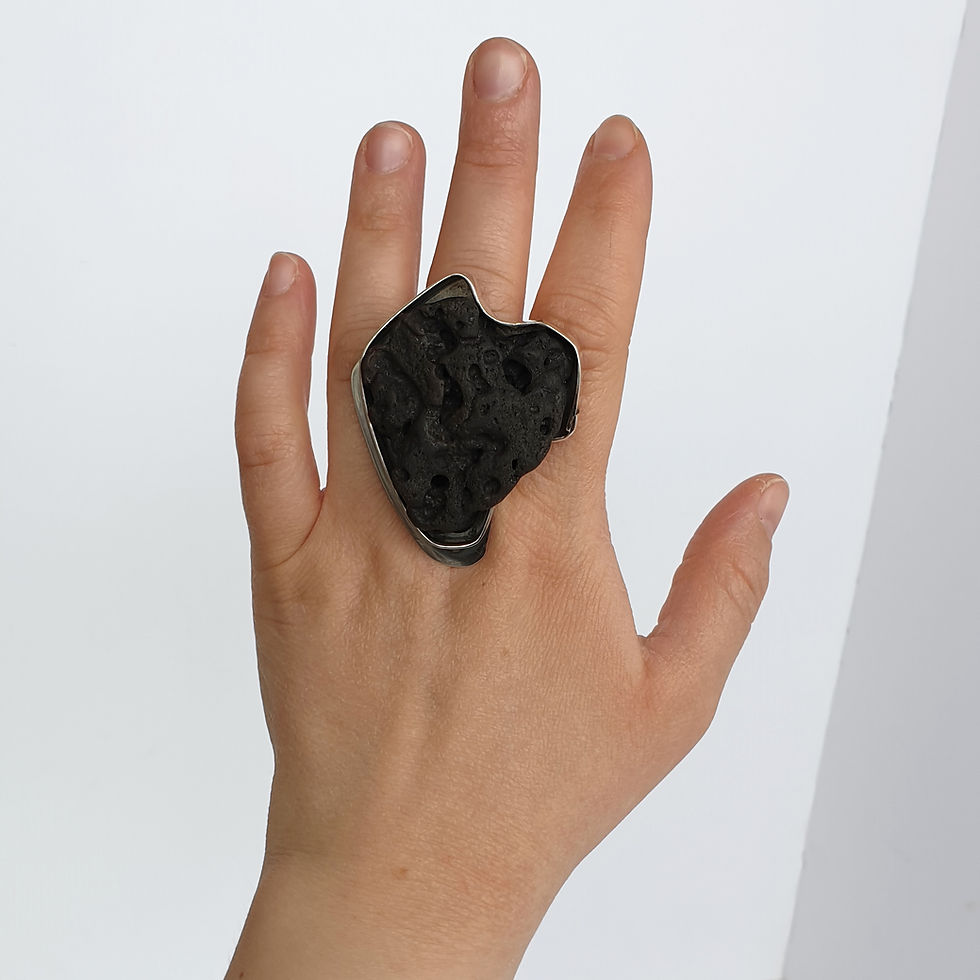 Thumbnail: Abstract silver ring with lava