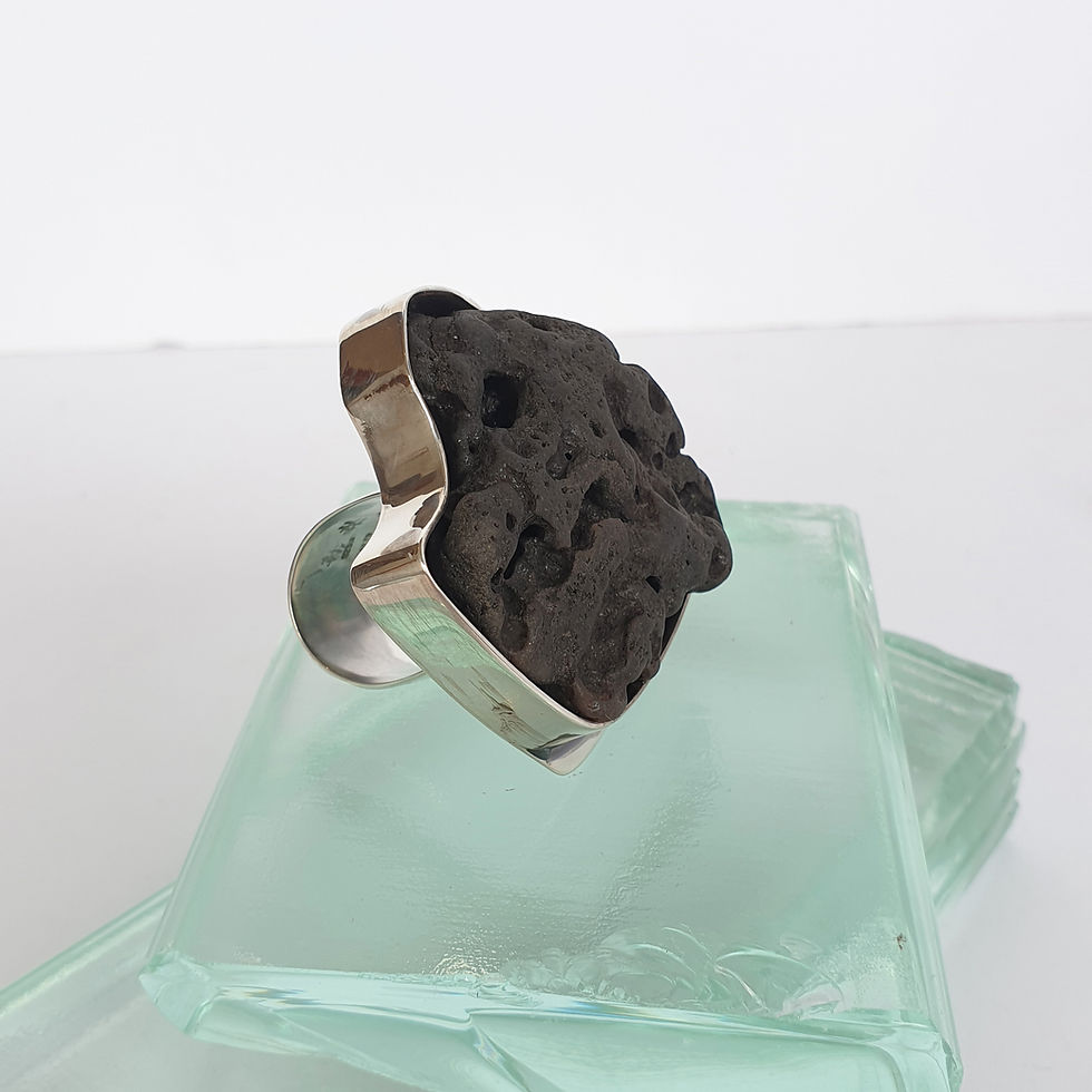 Thumbnail: Abstract silver ring with lava