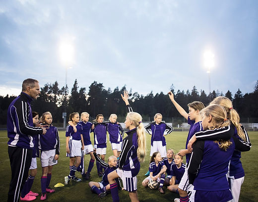 Girls Soccer Team with Coach