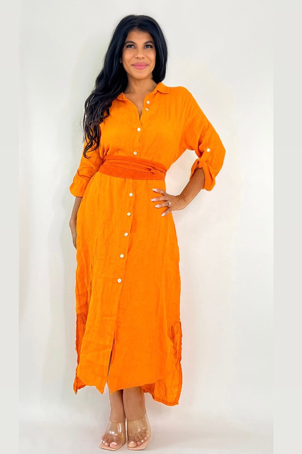 Miniatura: Woman in long orange shirt dress with sash