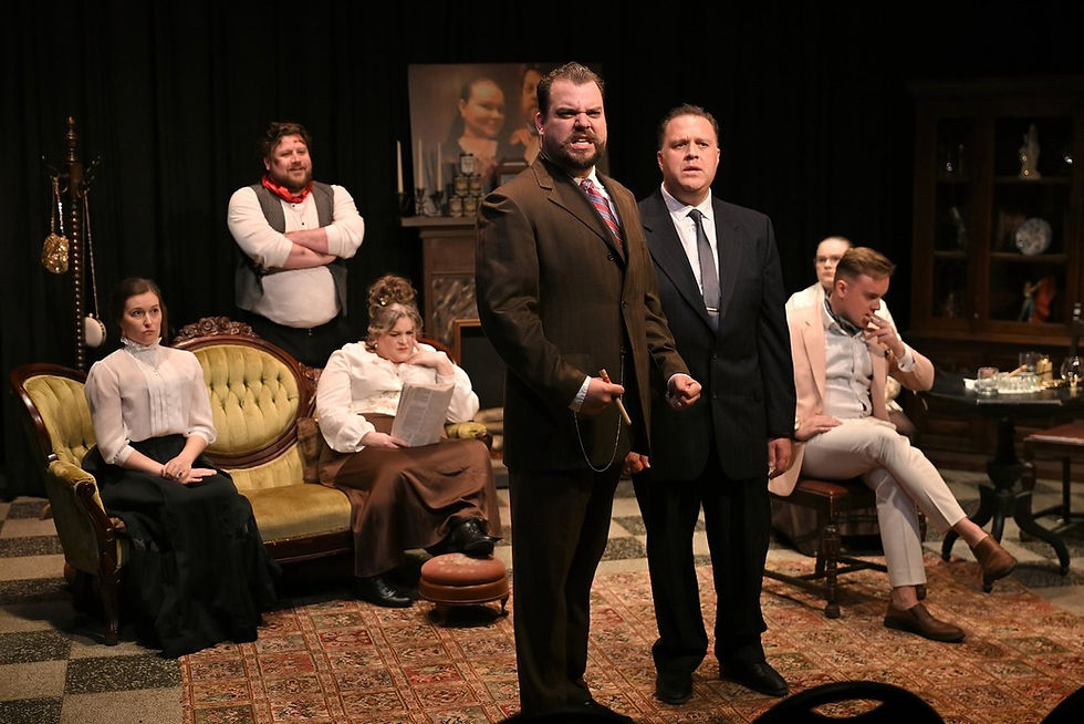 Roger (Ryan Starkweather) introduces the audience to Reginald (Ben Kennes). Photo by Ross Davidson.