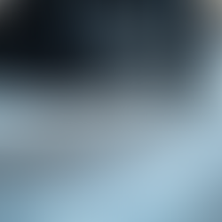 Road salt buildup on motorcycle wheel and frame