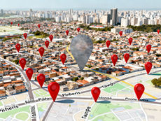 Google Maps de bairro em São Paulo com dezenas de pinos vermelhos de negócios, mas um pino está desbotado e quase invisível, representando invisibilidade no Google Maps