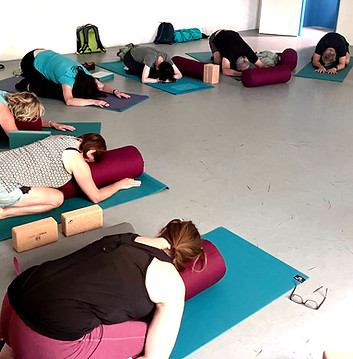 Conscious Relaxation workshop - participants enjoying child's pose.