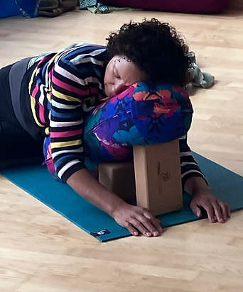Conscious Relaxation workshop - participant enjoying Reclining Deer pose.