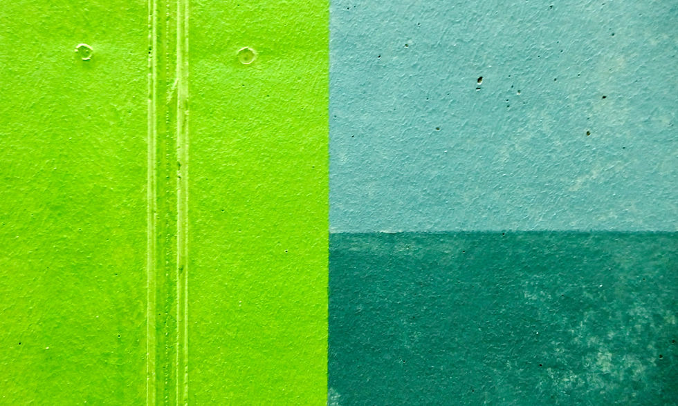 various shades of green and blue green paint on concrete