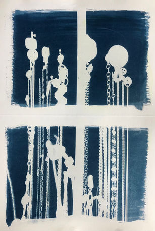 Cyanotype print of hanging jewelry, upside-down