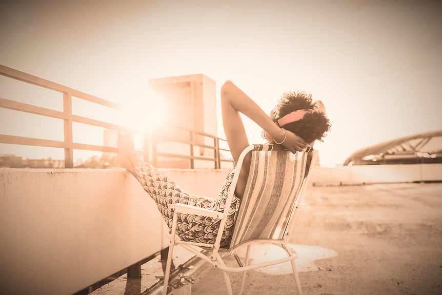 Woman Sitting on Roof_edited_edited.png