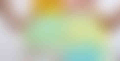 Wearing crocheted rainbow dungaree shorts