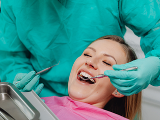 To keep your smile bright during the holiday season, brush and floss daily, limit stain-causing treats like red wine and coffee, stay hydrated, and schedule a post-holiday dental cleaning