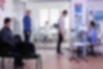 men-with-protection-masks-visiting-hospital-clinic-checking-appointment-respecting-social-