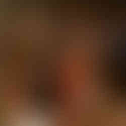 Couple dancing to Indian music in traditional Ghagra Cholis on their wedding day.