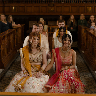 Lesbian couple sitting in Southport Town Hall taking their wedding vows.