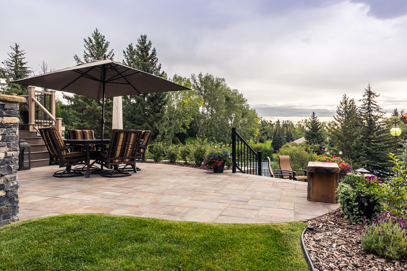 Finished residential patio and garden by Year-Round Landscaping