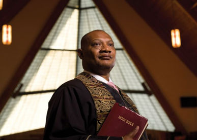 Bishop Reginald Jackson holding the Holy Bible