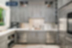 Duvall Estate kitchen with gray cabinets and mosaic backsplash