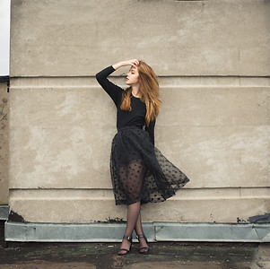 woman in black dress