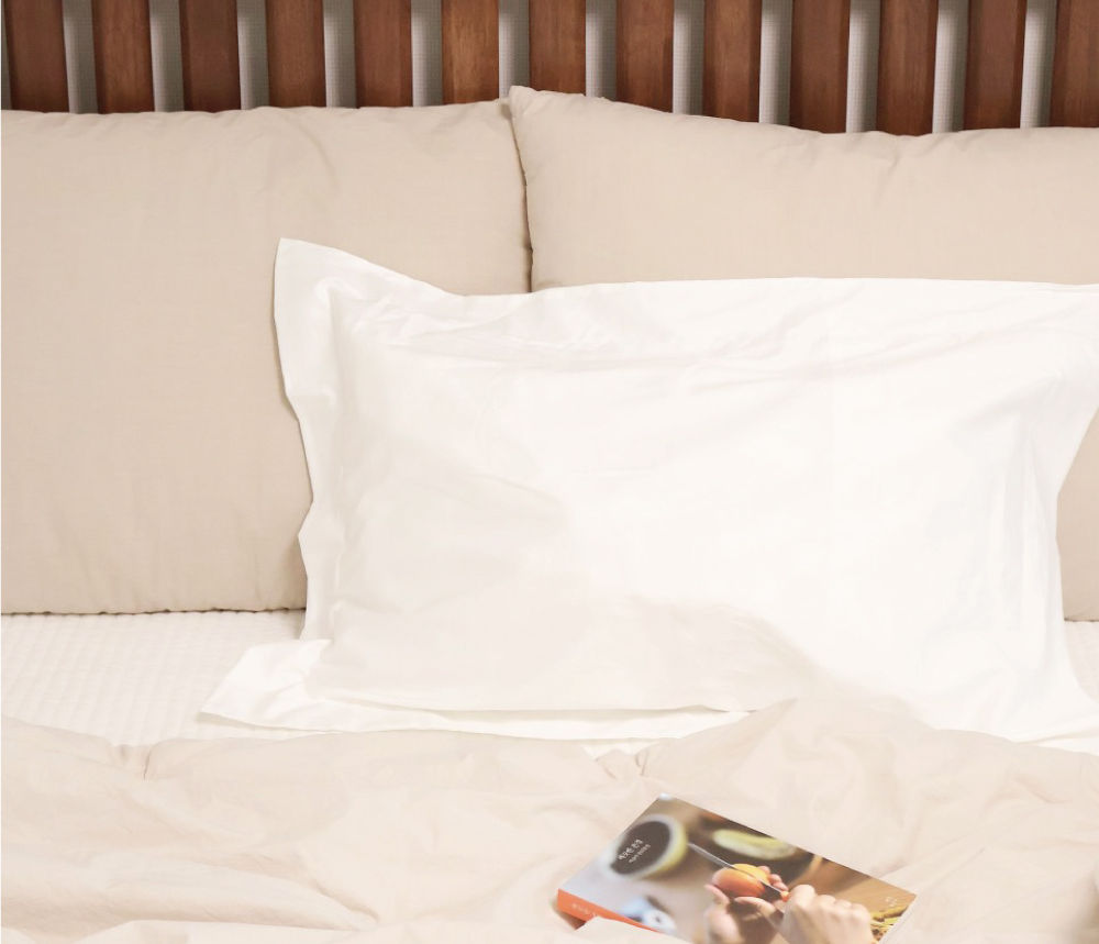 Pillow in emotionally appealing, comfortable bedroom setting