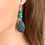 Thumbnail: Turquoise Stone Long Earrings with Funky Bird Charm - Handmade Sterling Silver