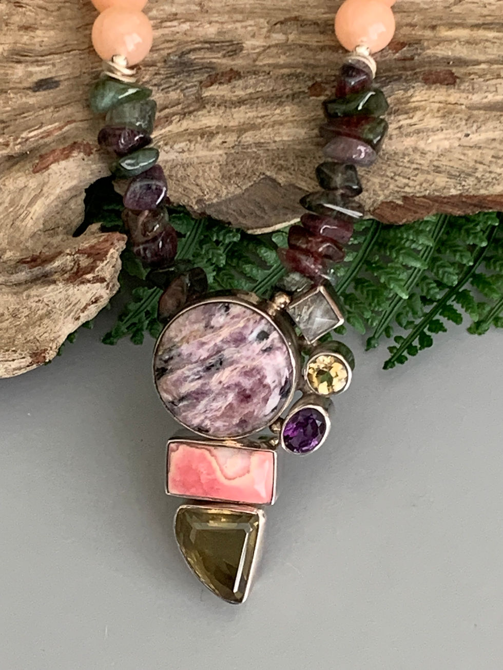 Thumbnail: Statement necklace with pink, purple, and yellow stones
