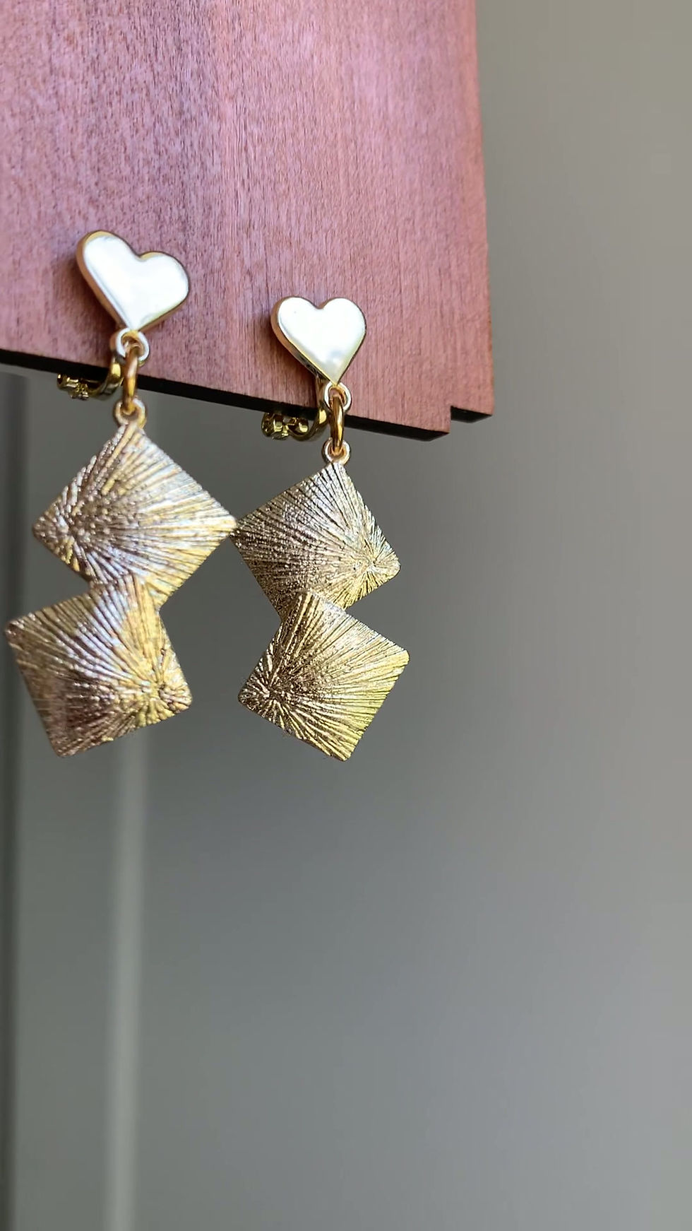 Thumbnail: A video of the gold tone clip on earrings for women