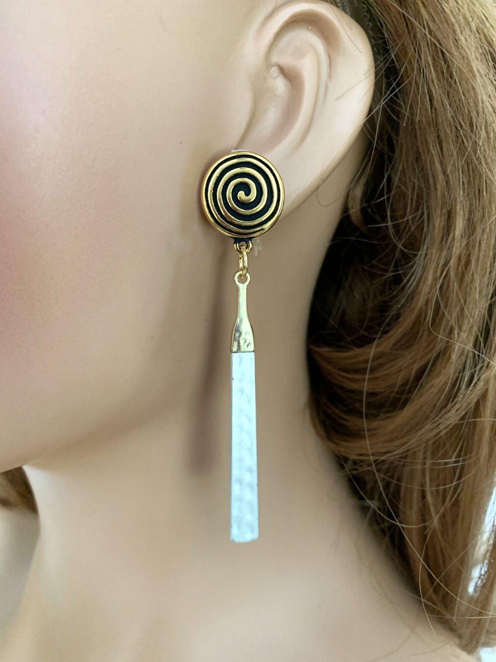Thumbnail: Earring with spiral top and white gemstone drop