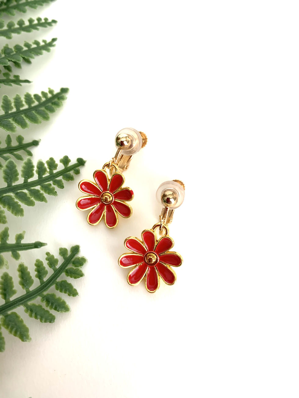 Thumbnail: Gold and red daisy clip-on earrings