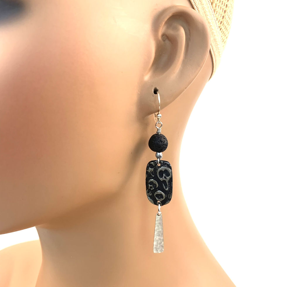Thumbnail: Black dangle earring with textured rectangular bead