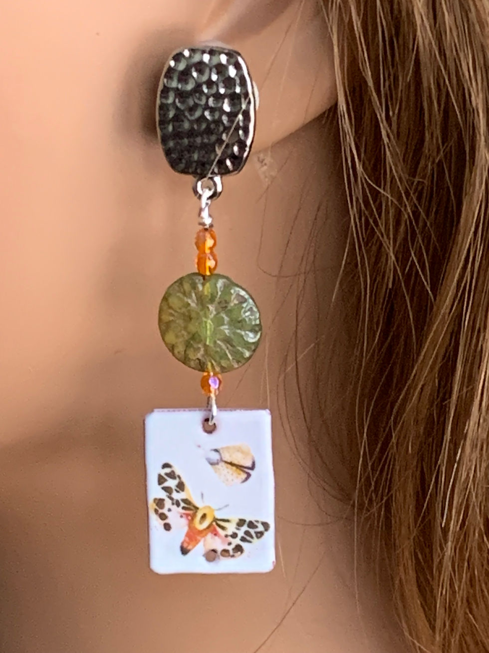 Thumbnail: Handcrafted drop earring with green bead and butterfly pendant