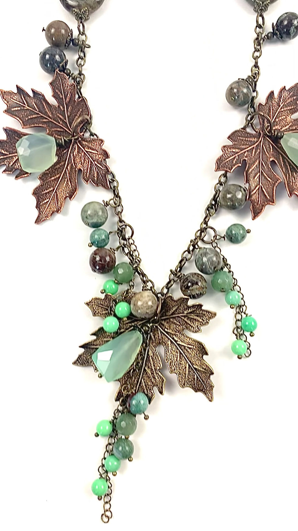 Thumbnail: A video of a handcrafted statement necklace with bronze leaves and green stones