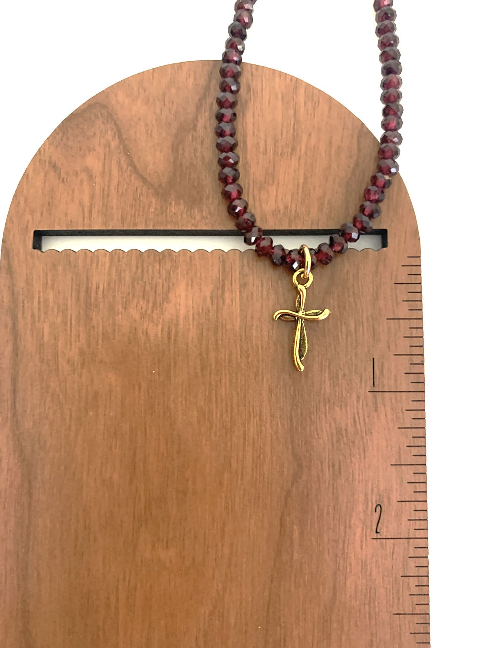 Thumbnail: Red beaded necklace with gold cross pendant