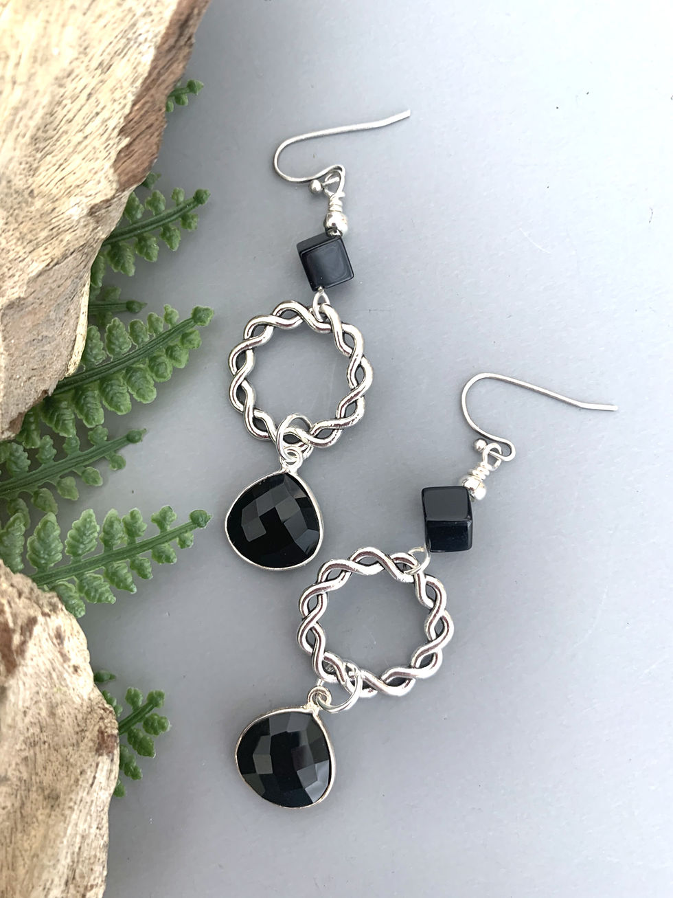 Thumbnail: Pair of silver chain earrings with black cube and teardrop stones