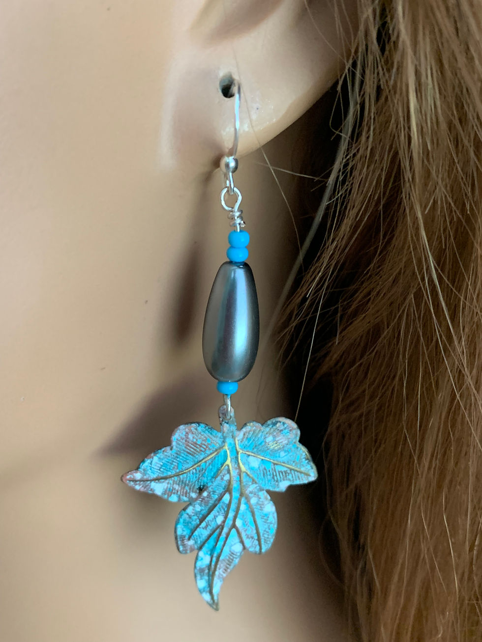 Thumbnail: Silver dangle earring with turquoise leaf, gray bead