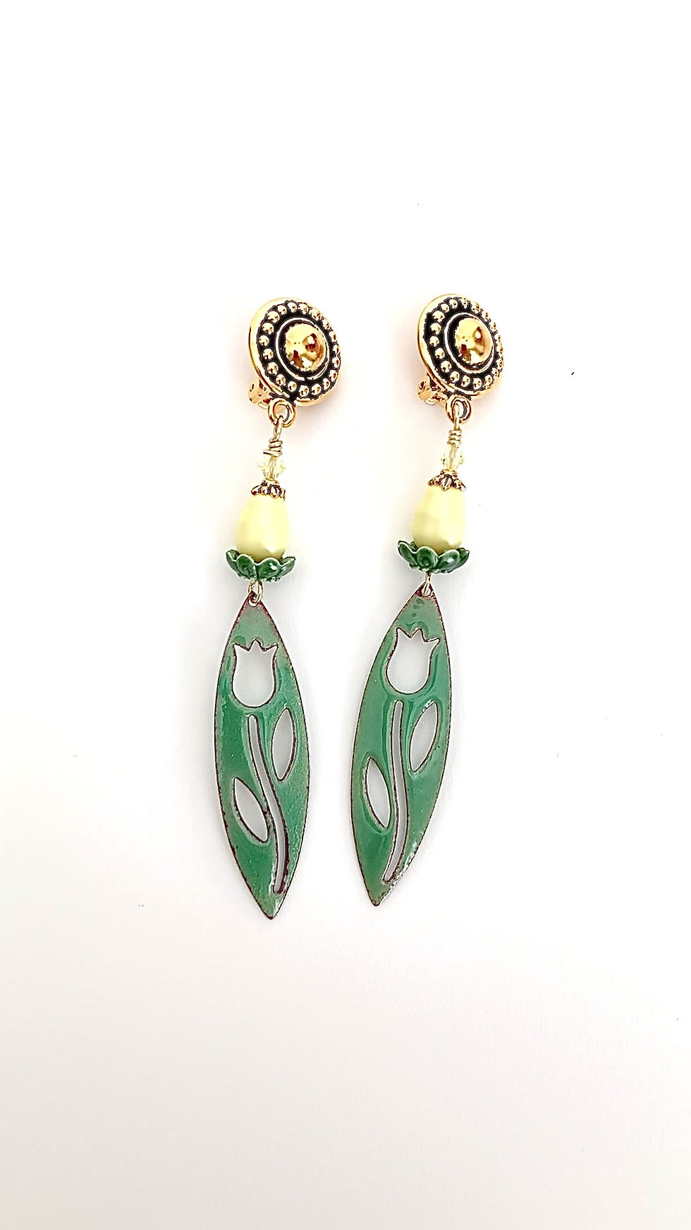 Thumbnail: A video of handcrafted green tulip flower copper enamel clip on earrings in gold