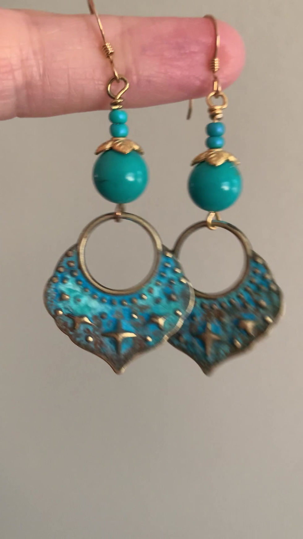 Thumbnail: A video of handcrafted turquoise blue pierced earrings