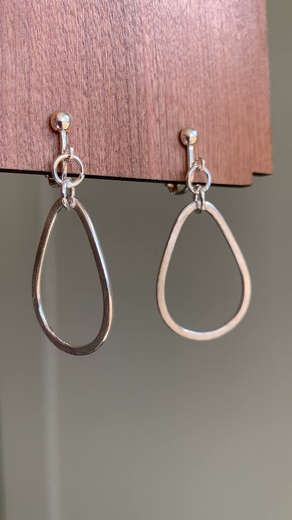 Thumbnail: video of silver teardrop clip-on earrings