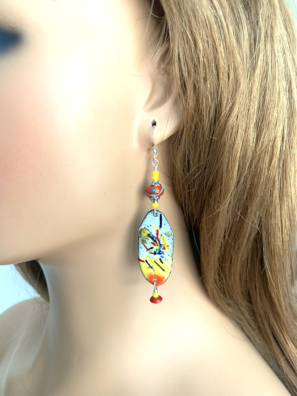 Thumbnail: Quirky blue and gold statement earring