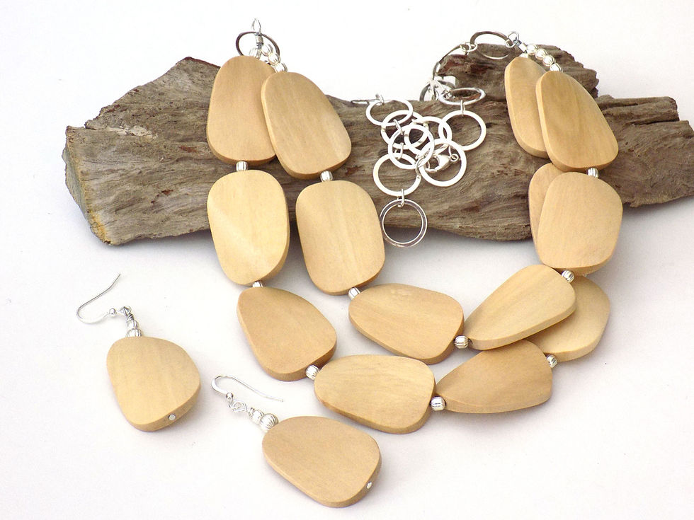 Thumbnail: Handcrafted light wood bead necklace and earrings set