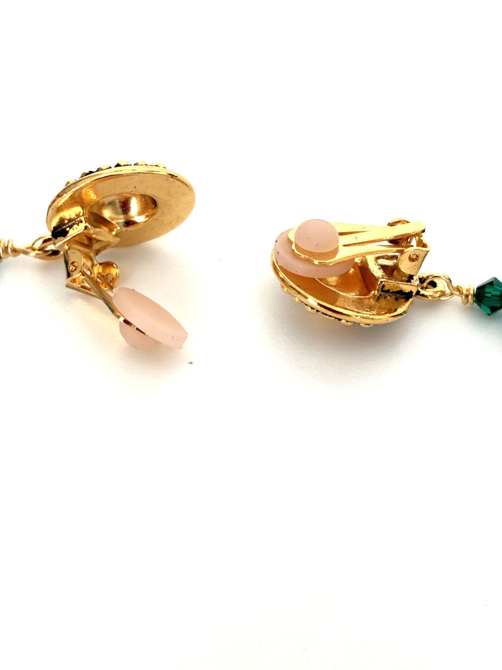 Thumbnail: Image of the back of gold-tone clips with soft rubber cushion inserts.
