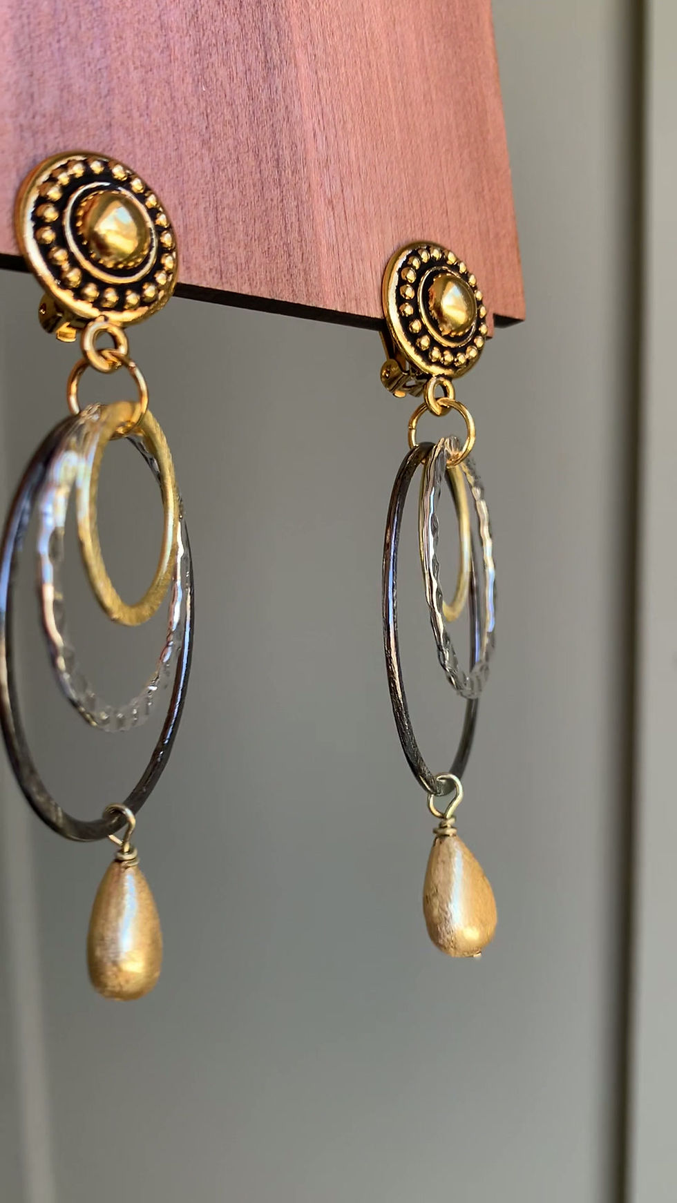 Thumbnail: video of tri -color metal clip-on hoop earrings