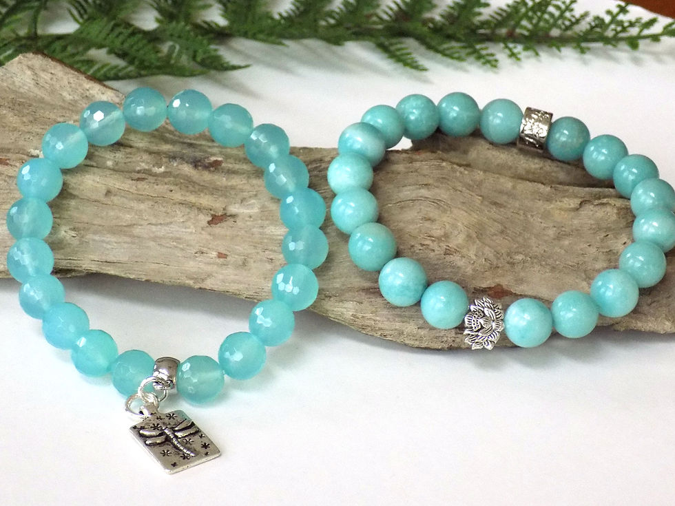 Thumbnail: Two turquoise beaded bracelets, one with dragonfly charm.